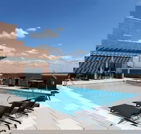 Global Luxury Suites at Woodmont Triangle North - Tourism House