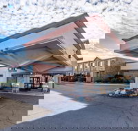 Quality Inn  Suites - Tourism House