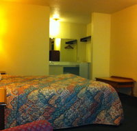Budget Inn Caravan Motel - Tourism House