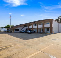 Econo Lodge Little Creek - Tourism House