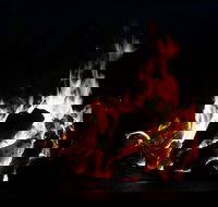 Sit  Sip by the Fire Pit - Tourism House